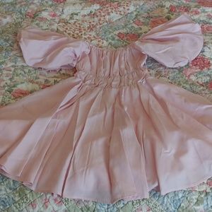 I am selling a pink dress.